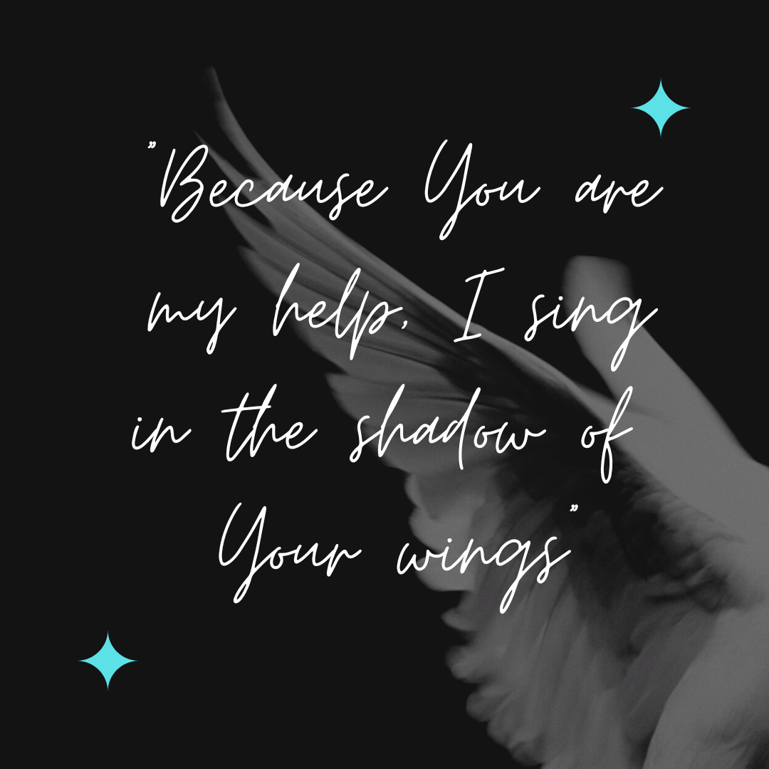 "Because You are my help, I sing in the shadow of Your wings" text on a background of dove's wings